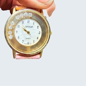 Japna Gold Tone Watch with Pink Strap and Crystal Accents